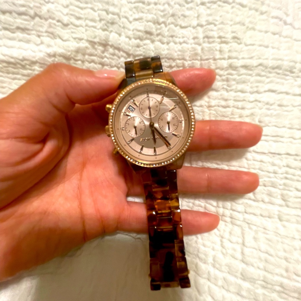 Tourtoise Shell style band. Gold Michael Kors Watch